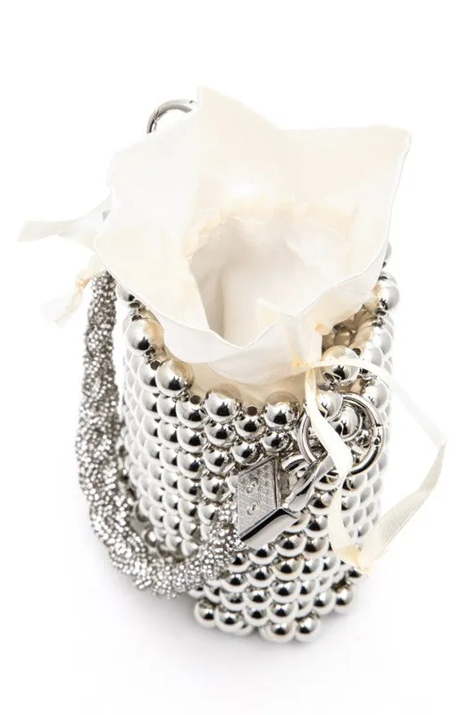 The 'Top Handle Swing Clutch Bag'